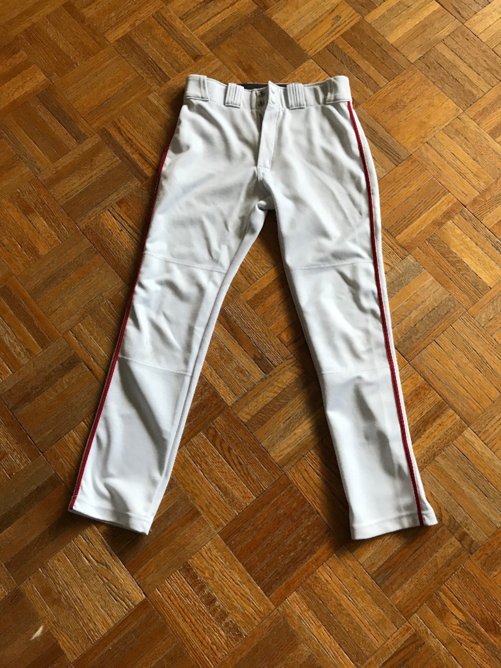 Easton Rival baseball pants with red piping size youth xl